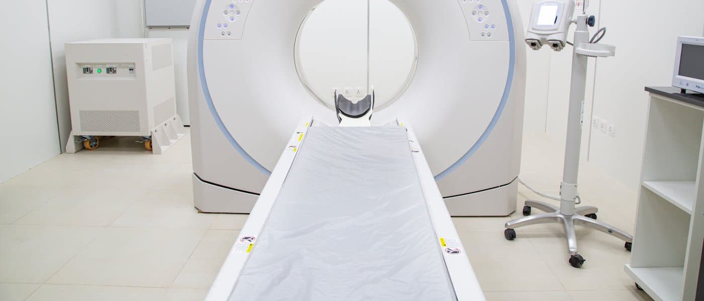 Modern high-tech medical imaging scanner in a clinical suite